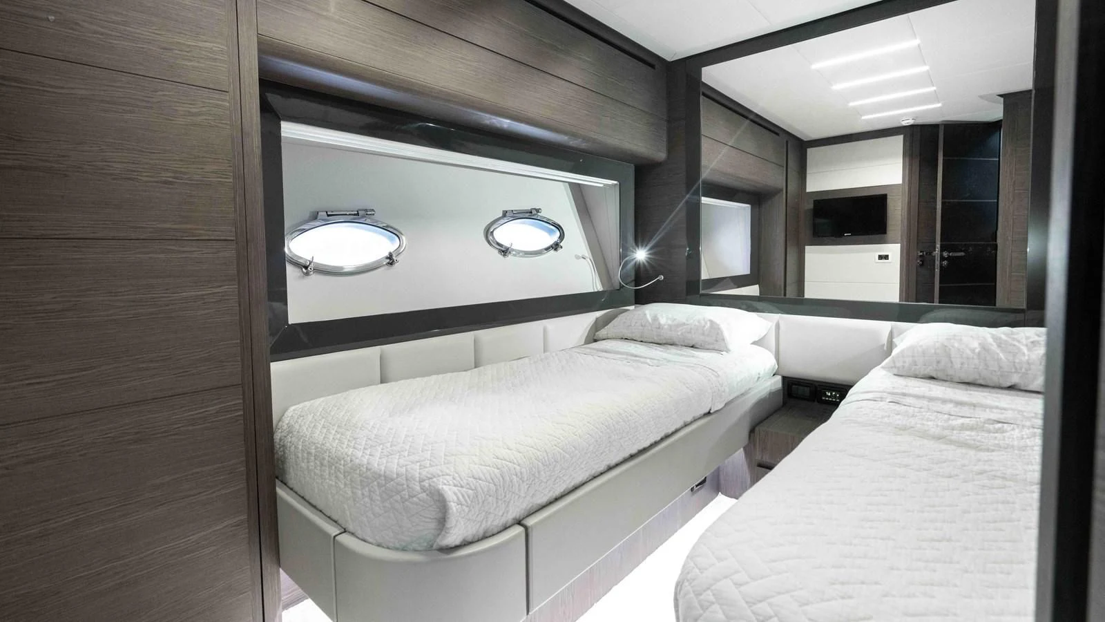 a room with two beds aboard UPTOWN GIRL Yacht for Sale