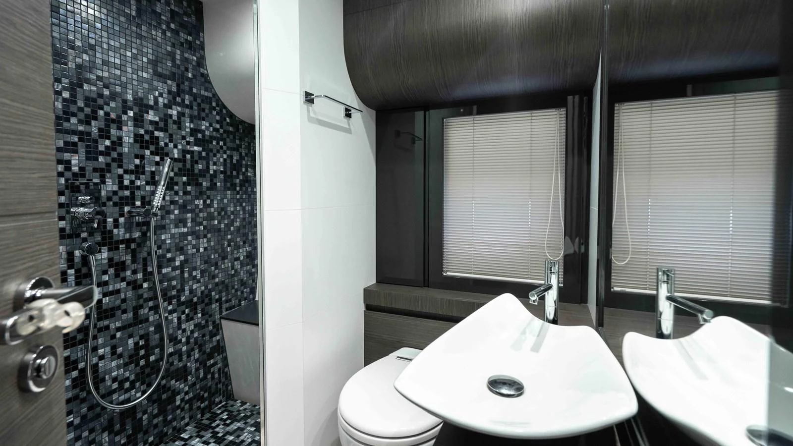 a bathroom with a sink and a shower aboard UPTOWN GIRL Yacht for Sale