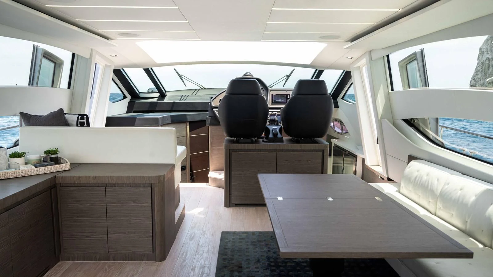 a room with a table and chairs aboard UPTOWN GIRL Yacht for Sale