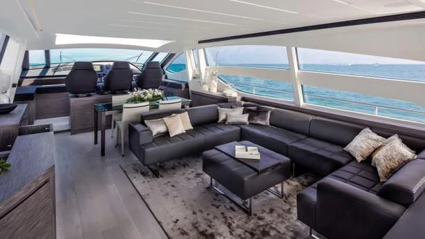 a living room with a large window aboard UPTOWN GIRL Yacht for Sale