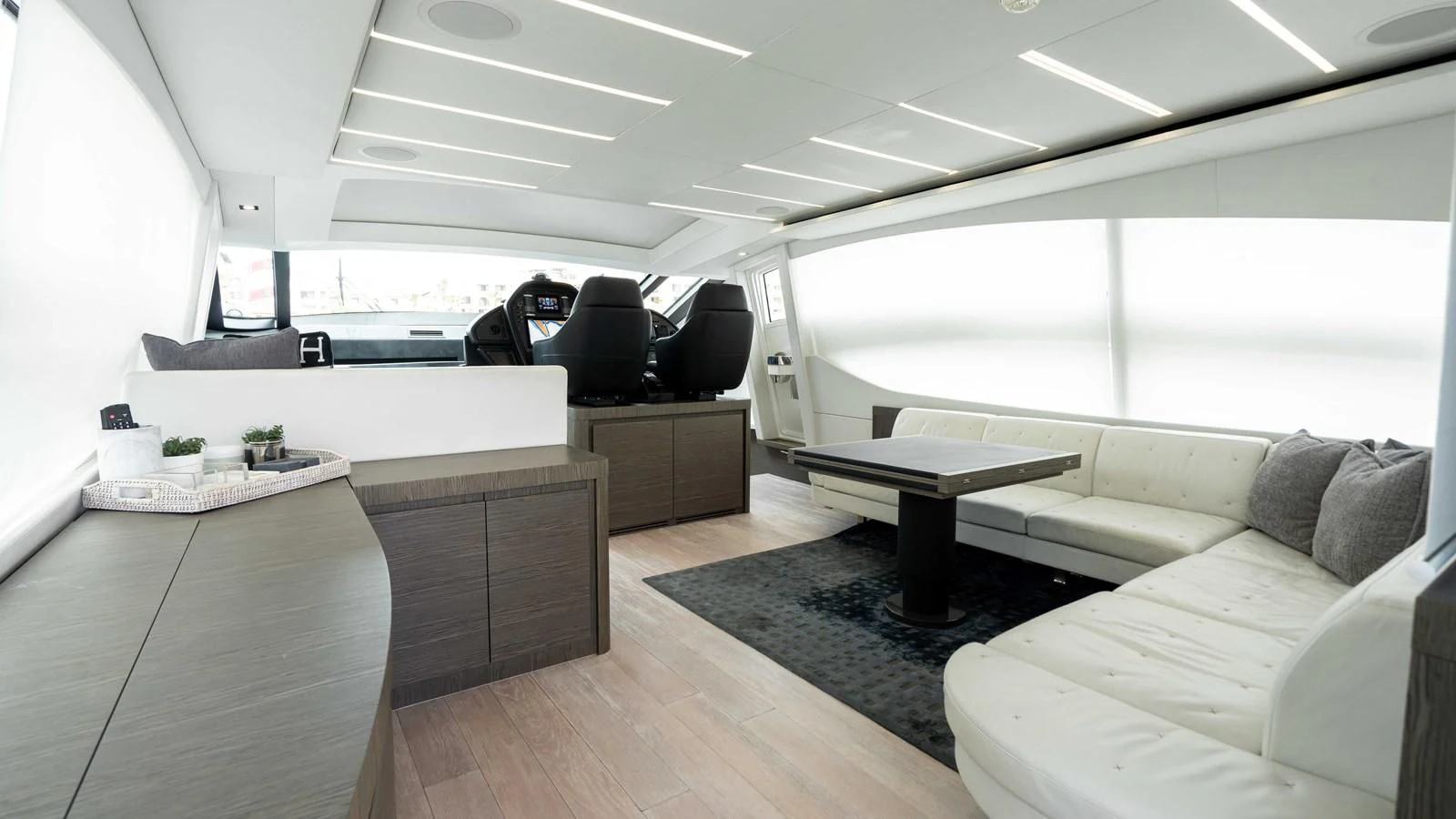 a room with a couch and a table aboard UPTOWN GIRL Yacht for Sale