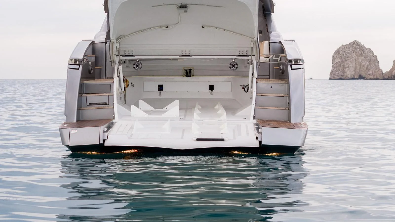 a white boat in the water aboard UPTOWN GIRL Yacht for Sale