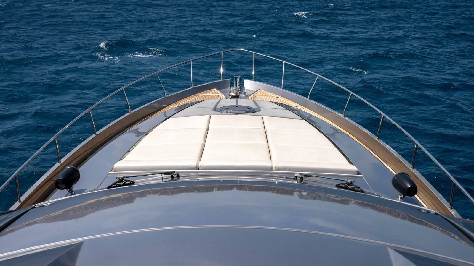 a white boat in the water aboard UPTOWN GIRL Yacht for Sale