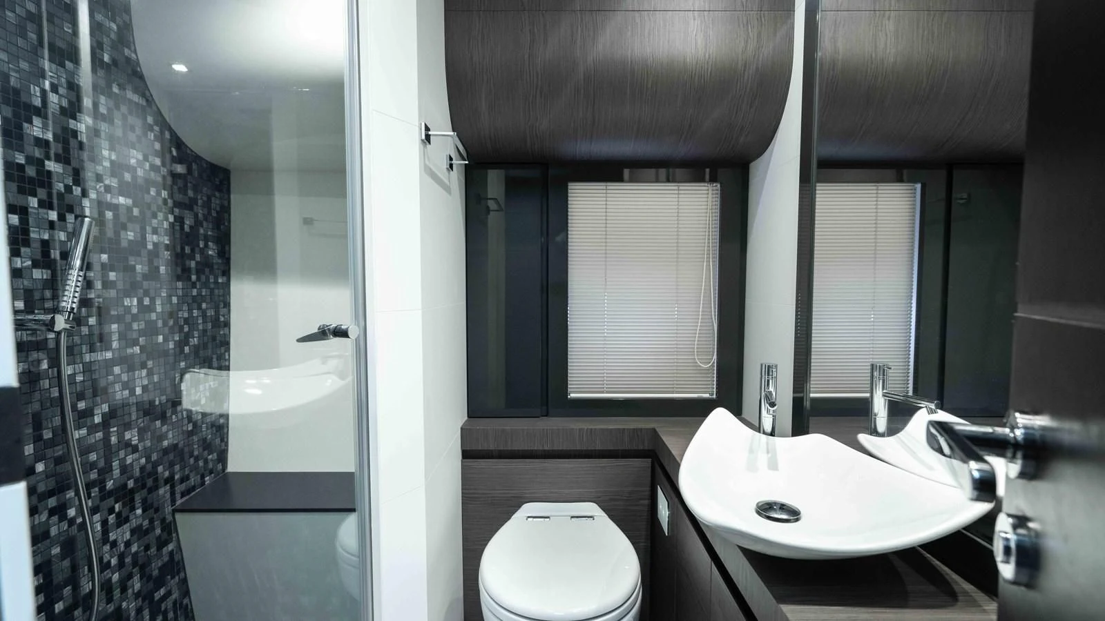 a bathroom with a sink and a toilet aboard UPTOWN GIRL Yacht for Sale