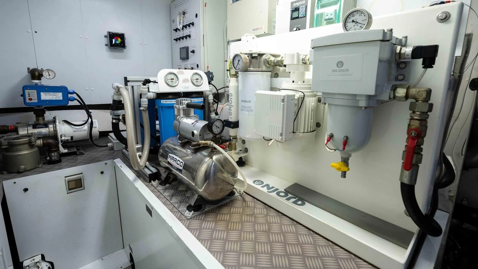 a machine with a large piece of equipment on it aboard UPTOWN GIRL Yacht for Sale