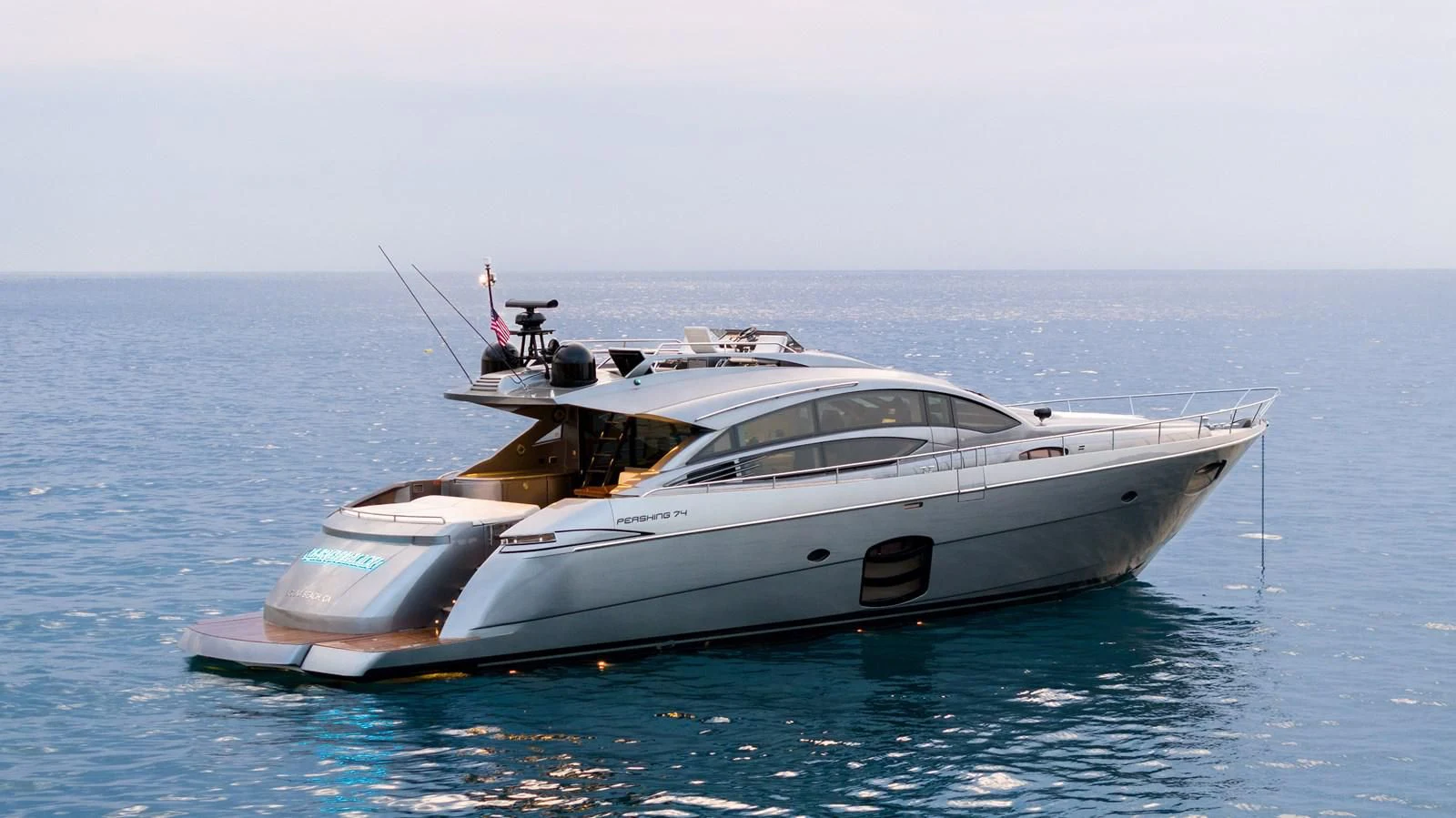a white yacht in the water aboard UPTOWN GIRL Yacht for Sale