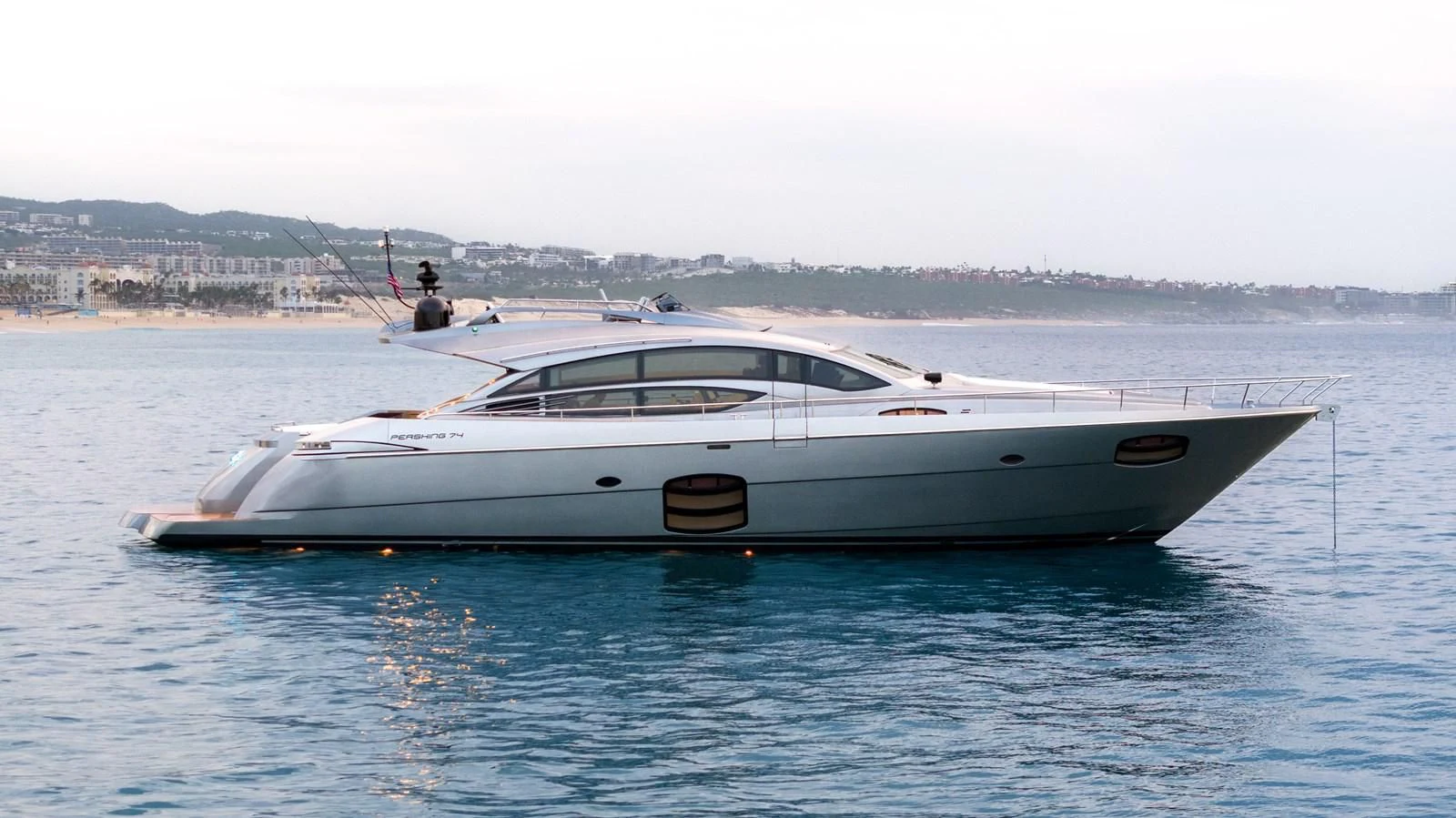 a man and a woman on a boat in the water aboard UPTOWN GIRL Yacht for Sale