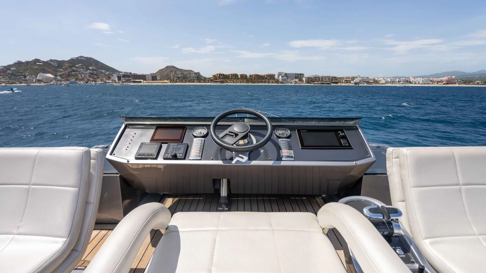 a boat with a steering wheel aboard UPTOWN GIRL Yacht for Sale