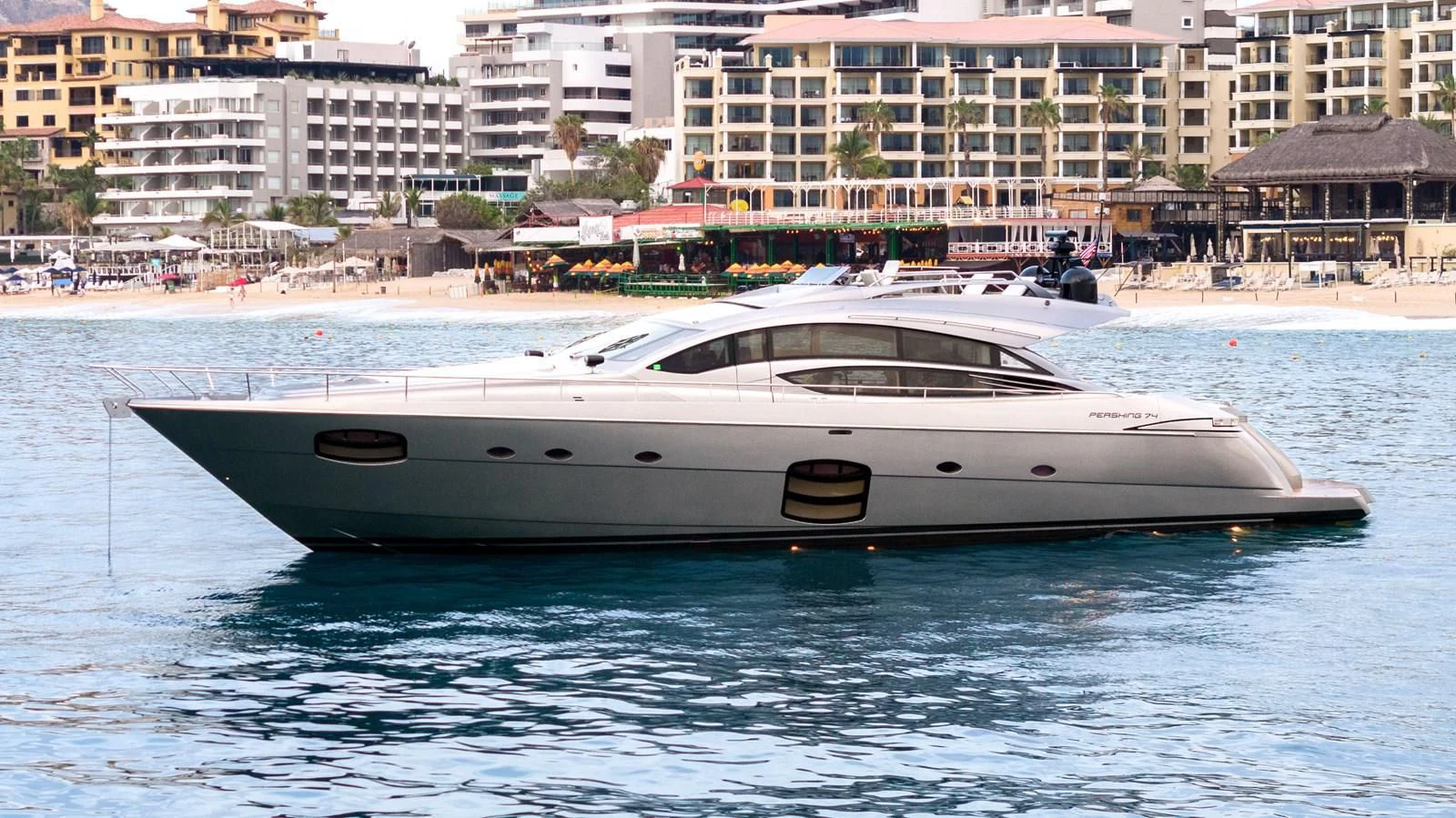 a white boat in the water aboard UPTOWN GIRL Yacht for Sale
