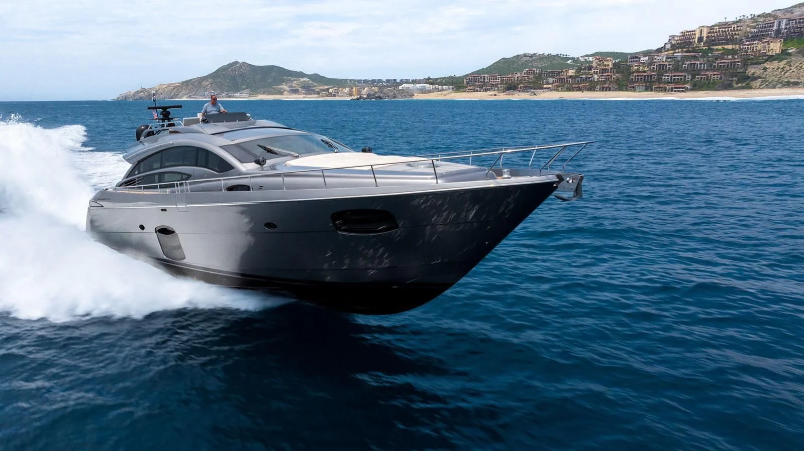 a boat on the water aboard UPTOWN GIRL Yacht for Sale