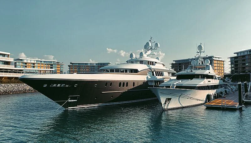 a large ship docked at a port aboard MYSORAH Yacht for Sale
