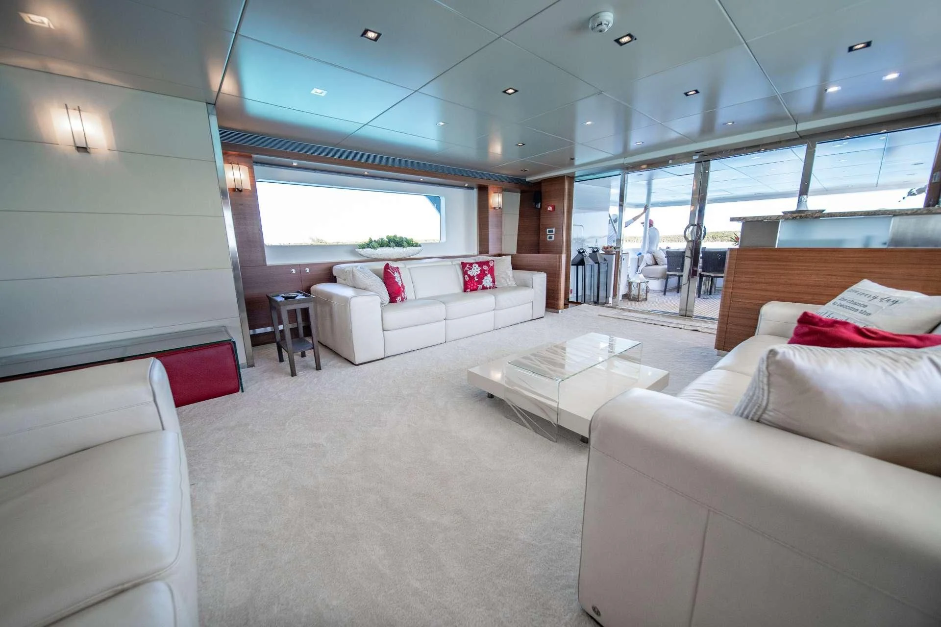 a living room with a large window aboard SEA AXIS Yacht for Charter
