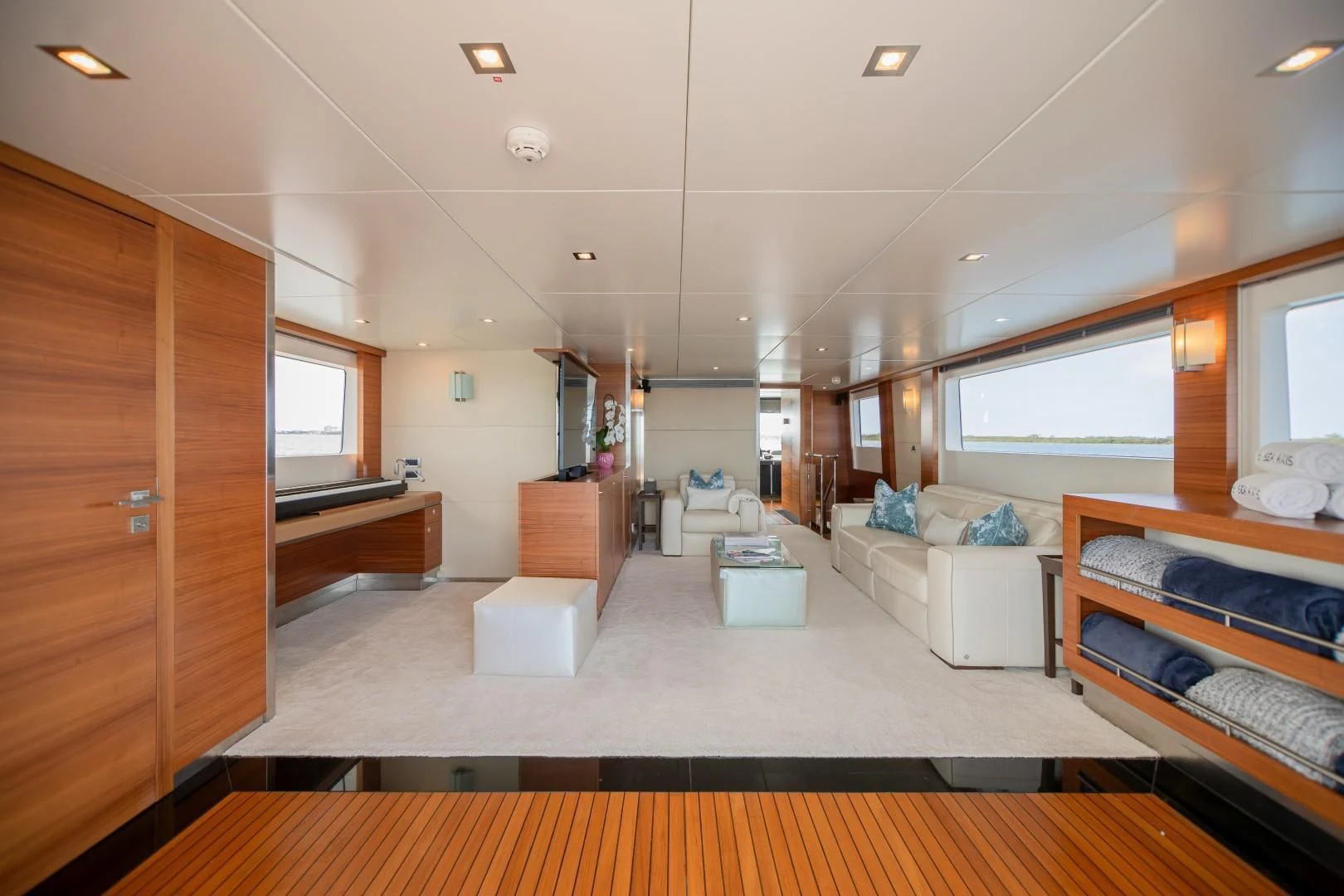 a room with a bed and a desk aboard SEA AXIS Yacht for Charter