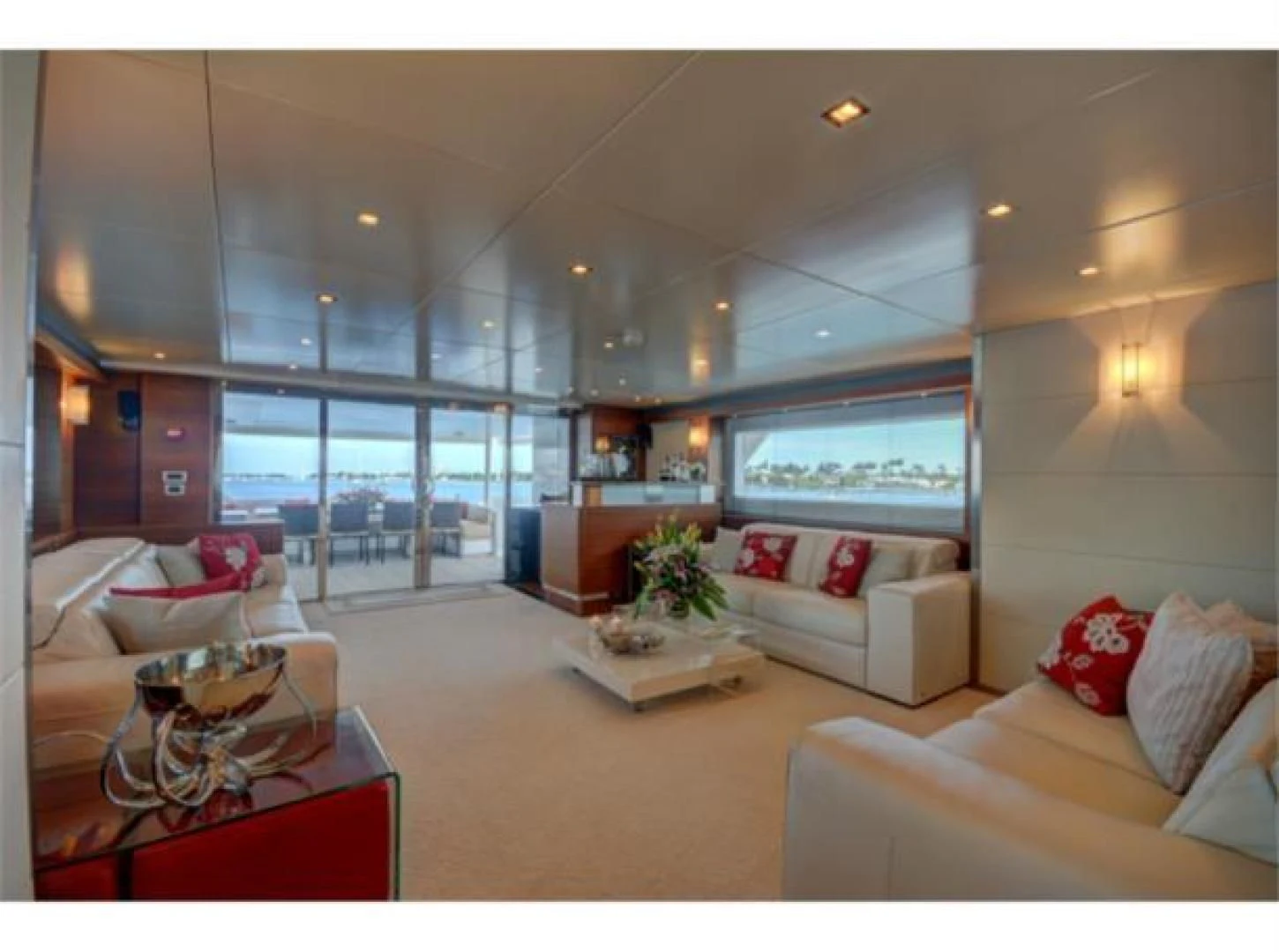 a living room with a large window aboard SEA AXIS Yacht for Charter