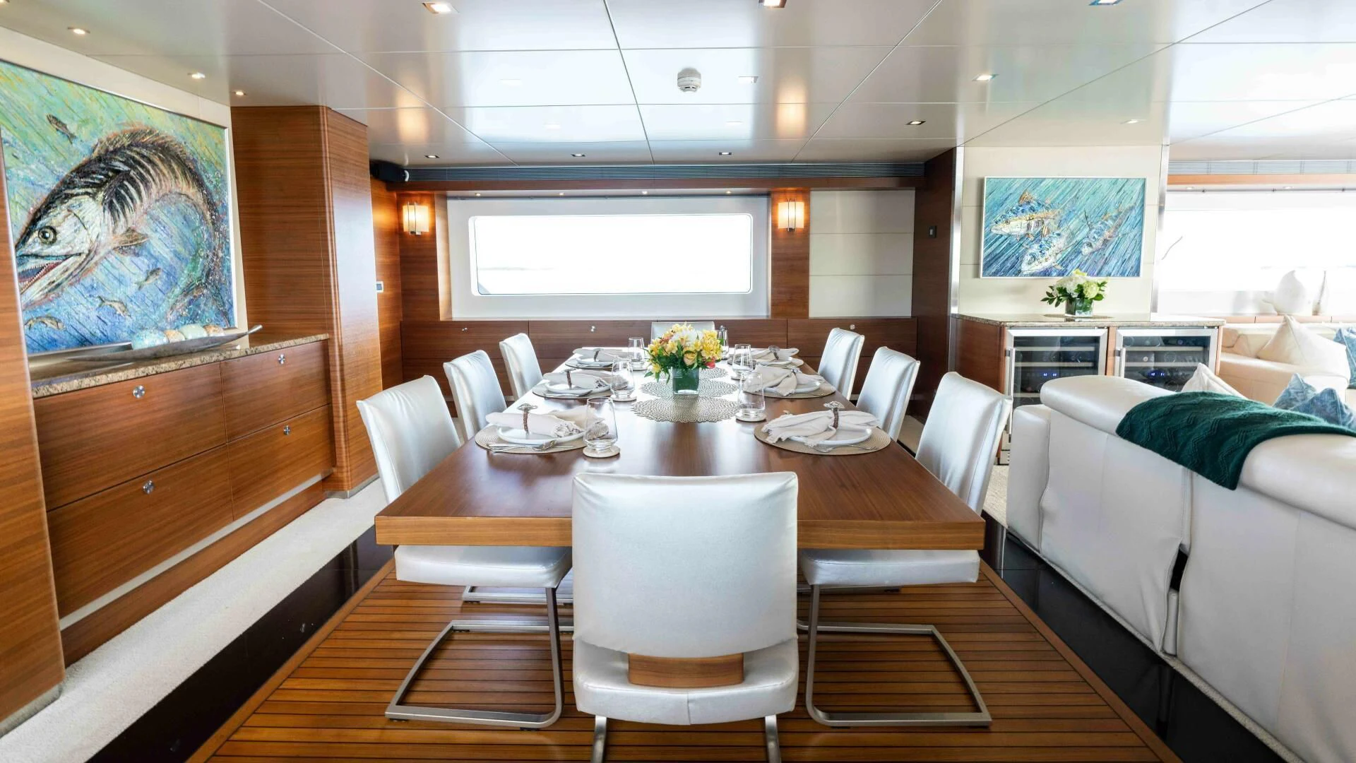 a dining table in a room aboard SEA AXIS Yacht for Charter