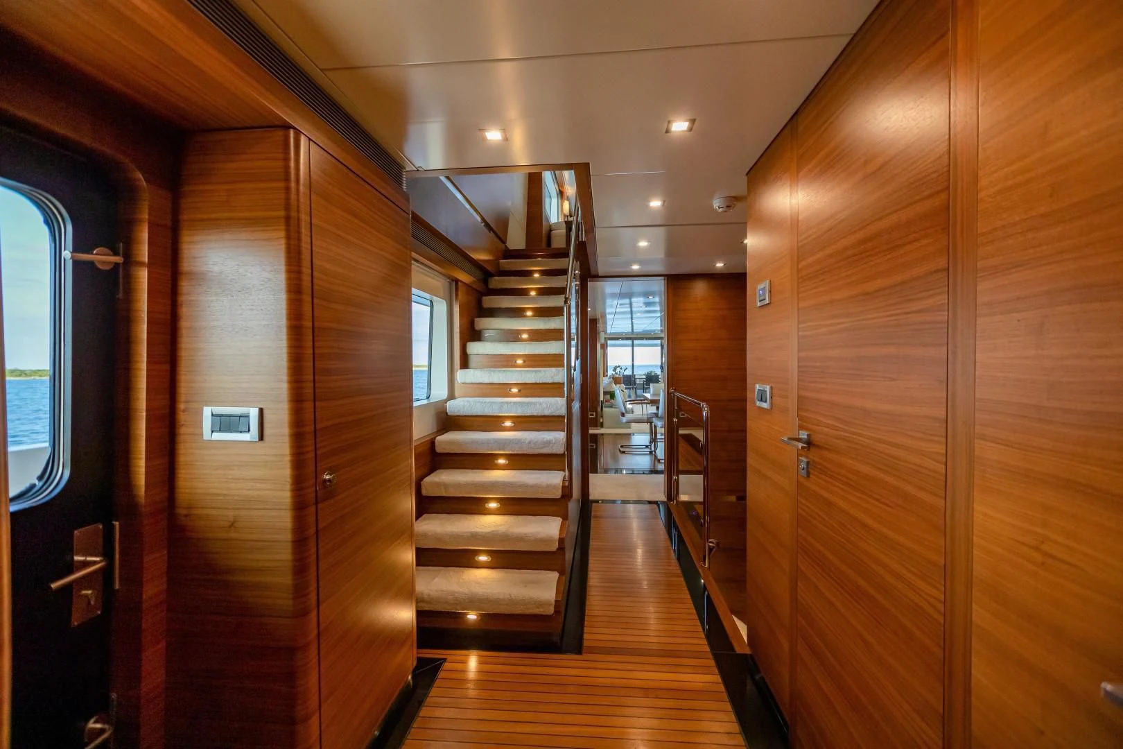 a wooden staircase in a building aboard SEA AXIS Yacht for Charter
