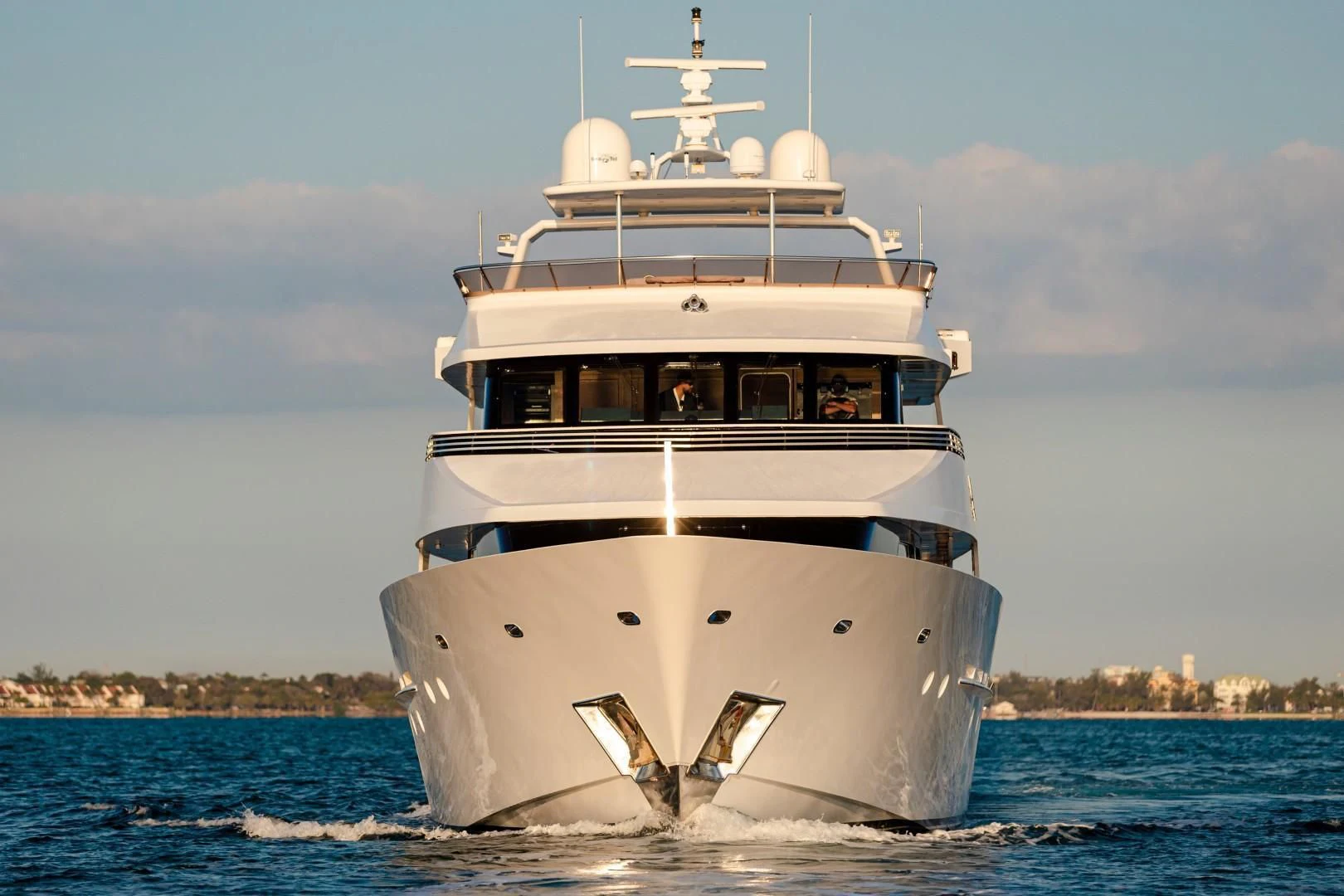 a large white boat on the water aboard SEA AXIS Yacht for Charter