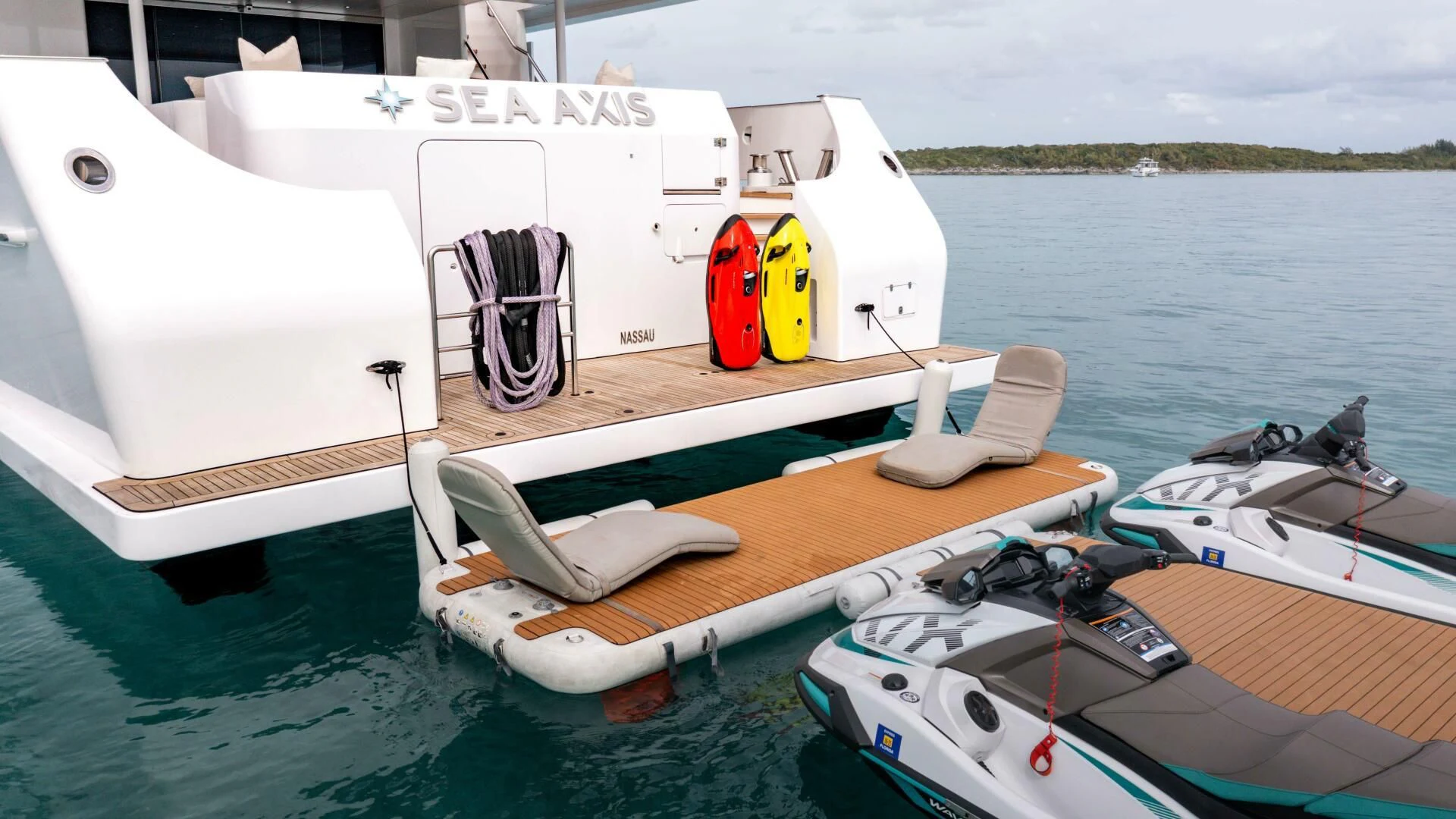 a boat with a motor attached to it aboard SEA AXIS Yacht for Charter