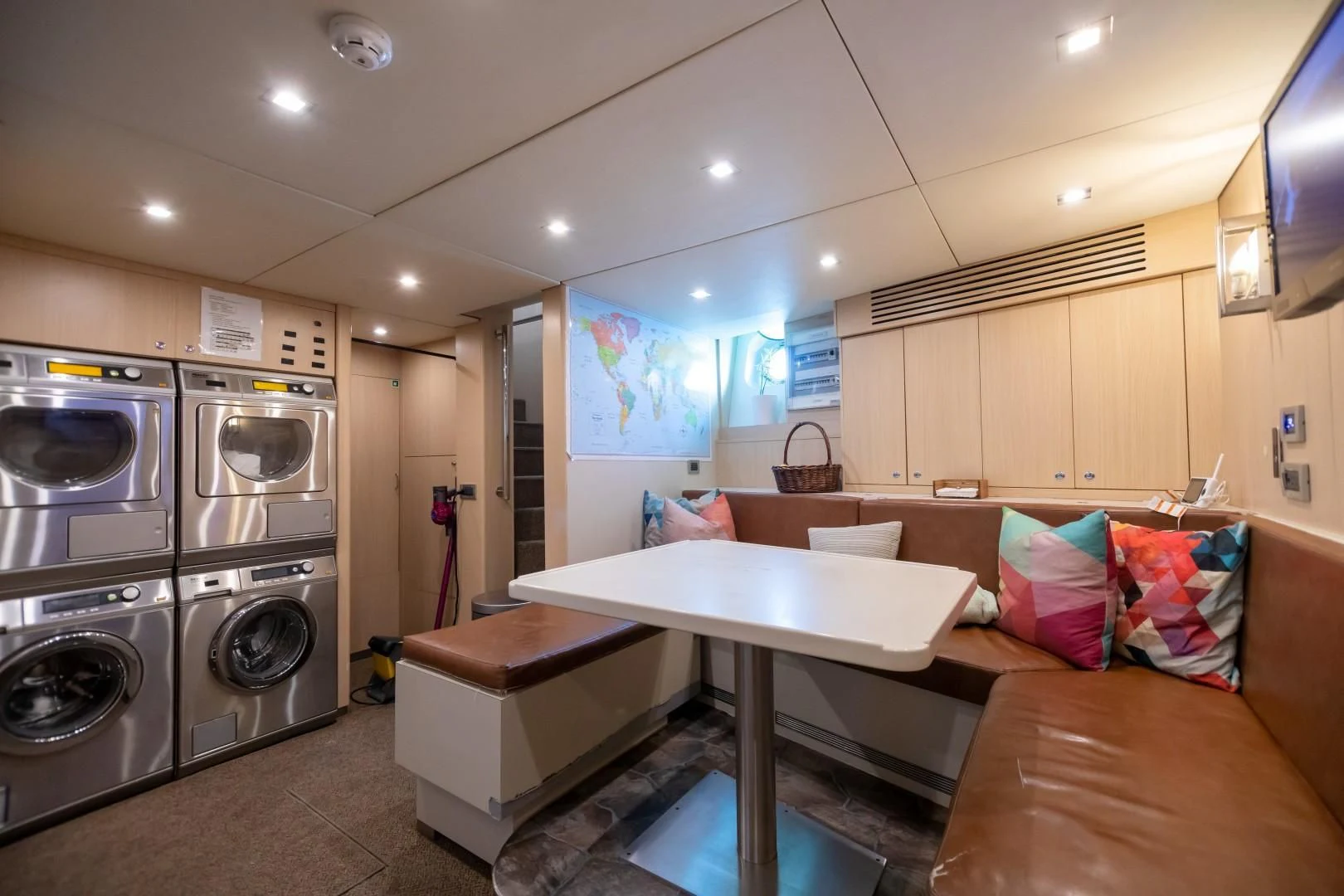 a kitchen and living room aboard SEA AXIS Yacht for Charter