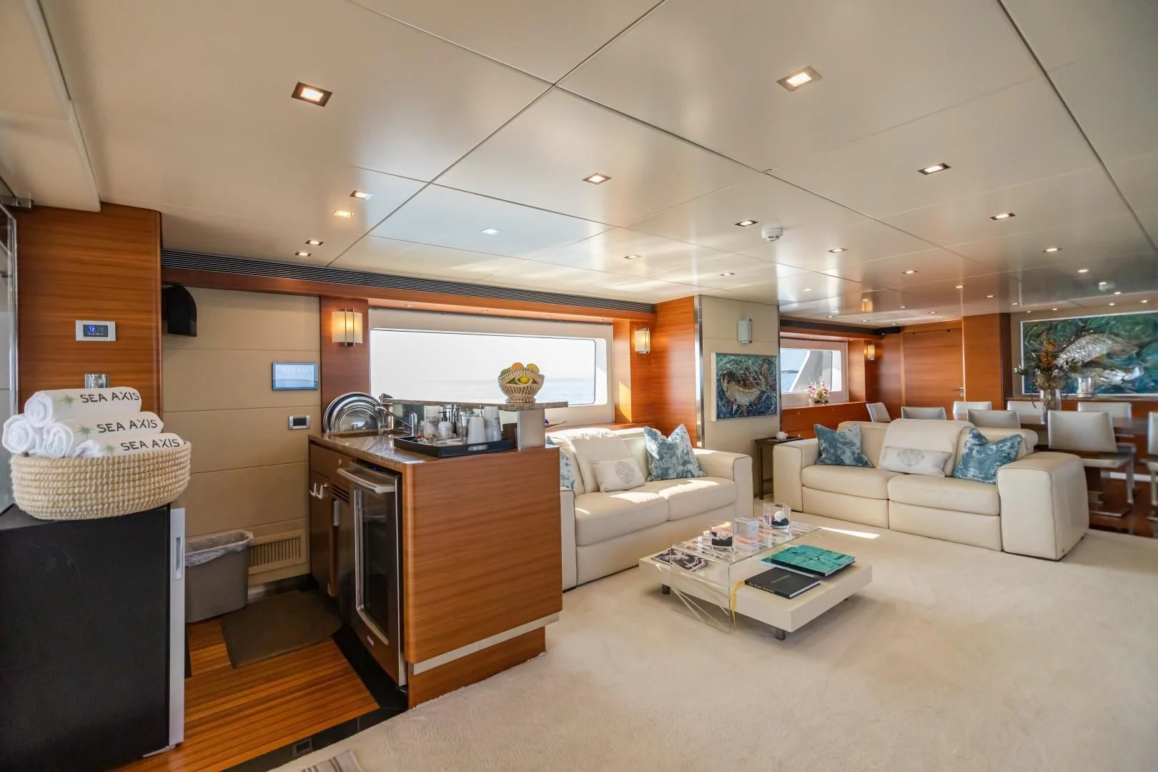 a living room with a couch and a coffee table aboard SEA AXIS Yacht for Charter