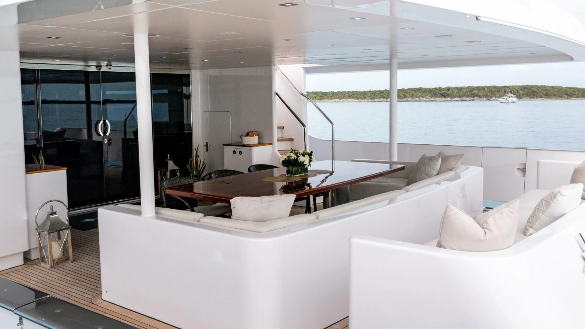 a room with a couch and a table aboard SEA AXIS Yacht for Charter