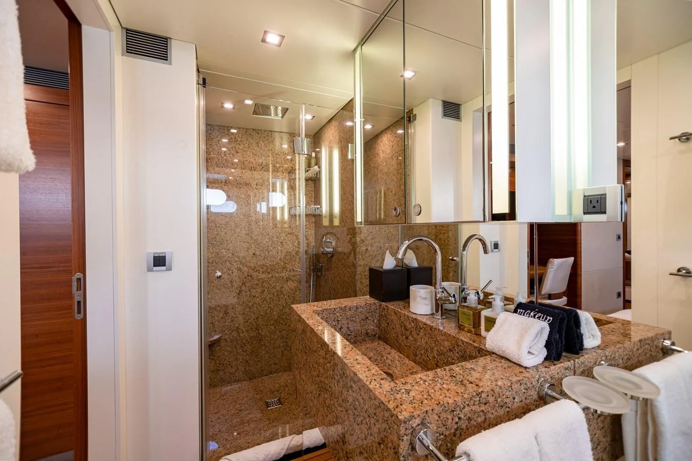 a bathroom with a large countertop aboard SEA AXIS Yacht for Charter