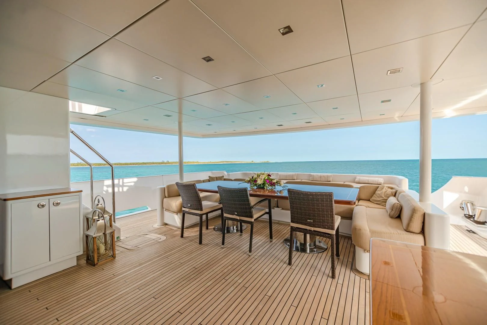 a room with a table and chairs aboard SEA AXIS Yacht for Charter