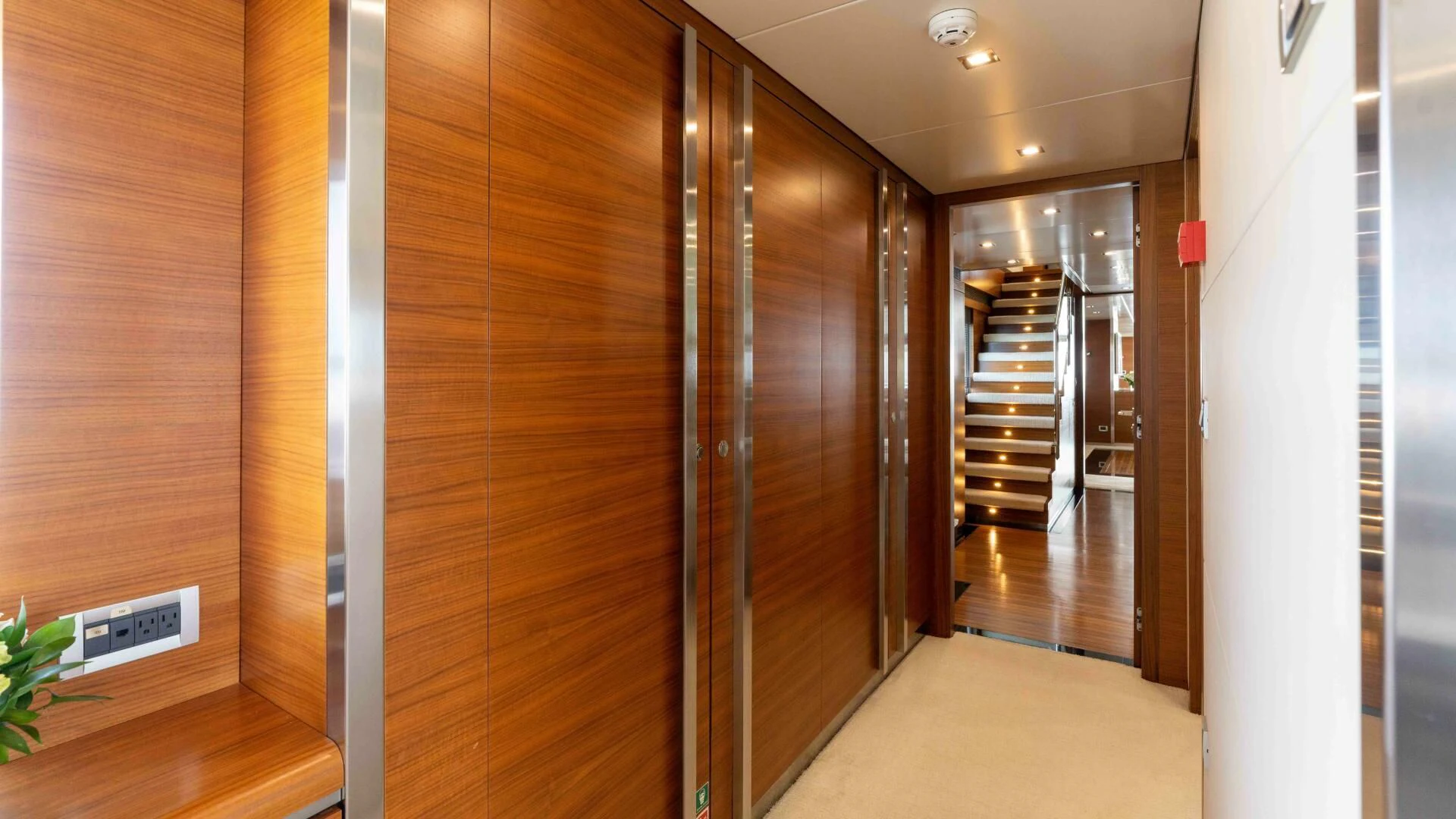 a room with wooden doors aboard SEA AXIS Yacht for Charter