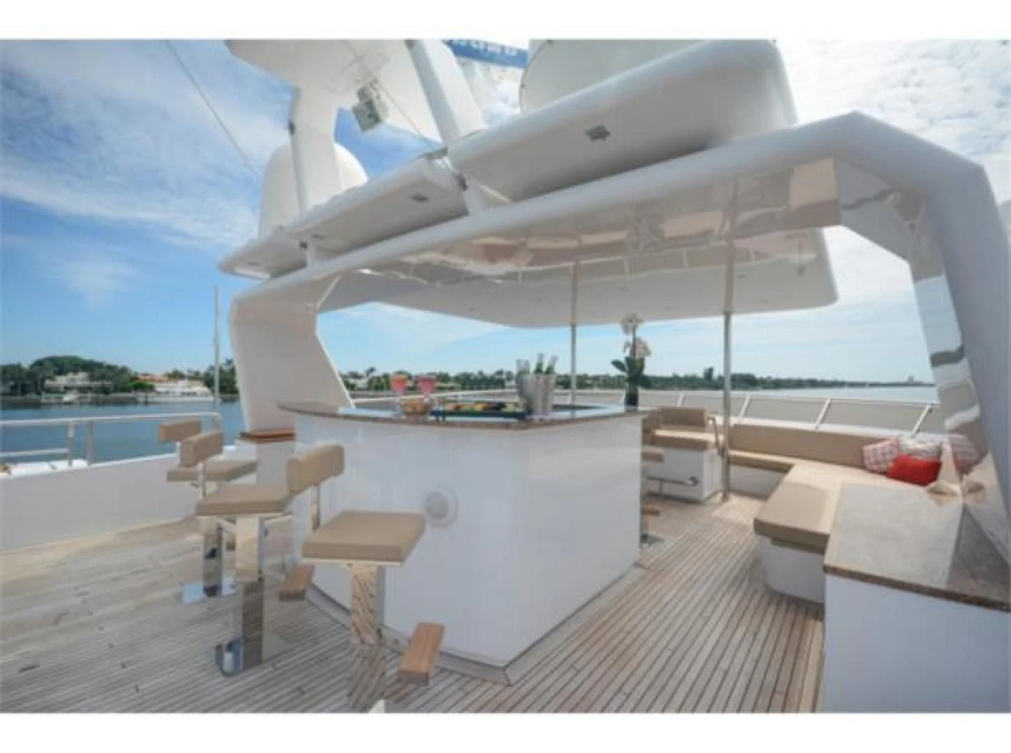 a white tent with a deck and chairs on a deck aboard SEA AXIS Yacht for Charter