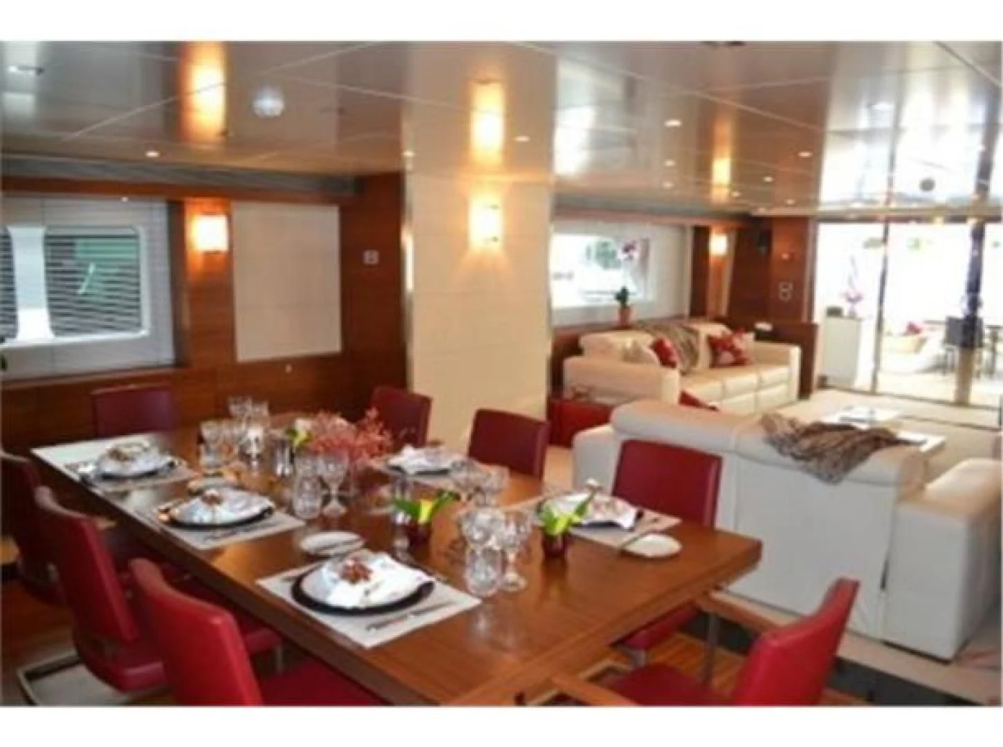 a dining room with a table set aboard SEA AXIS Yacht for Charter