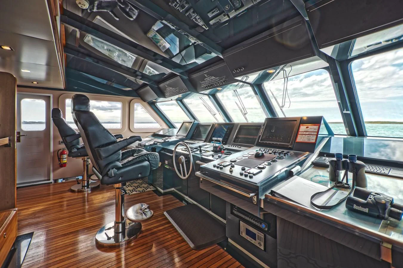 a vehicle with many computers and monitors aboard SEA AXIS Yacht for Charter