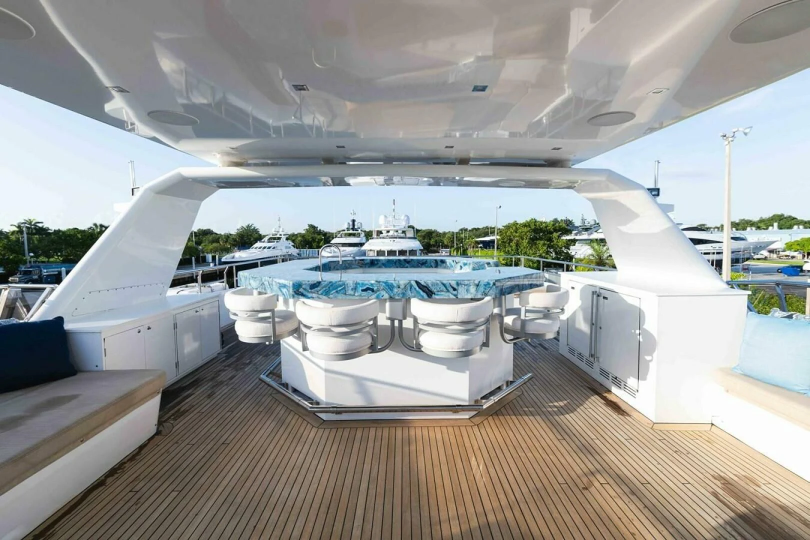 a large white boat on a deck aboard SEA AXIS Yacht for Charter