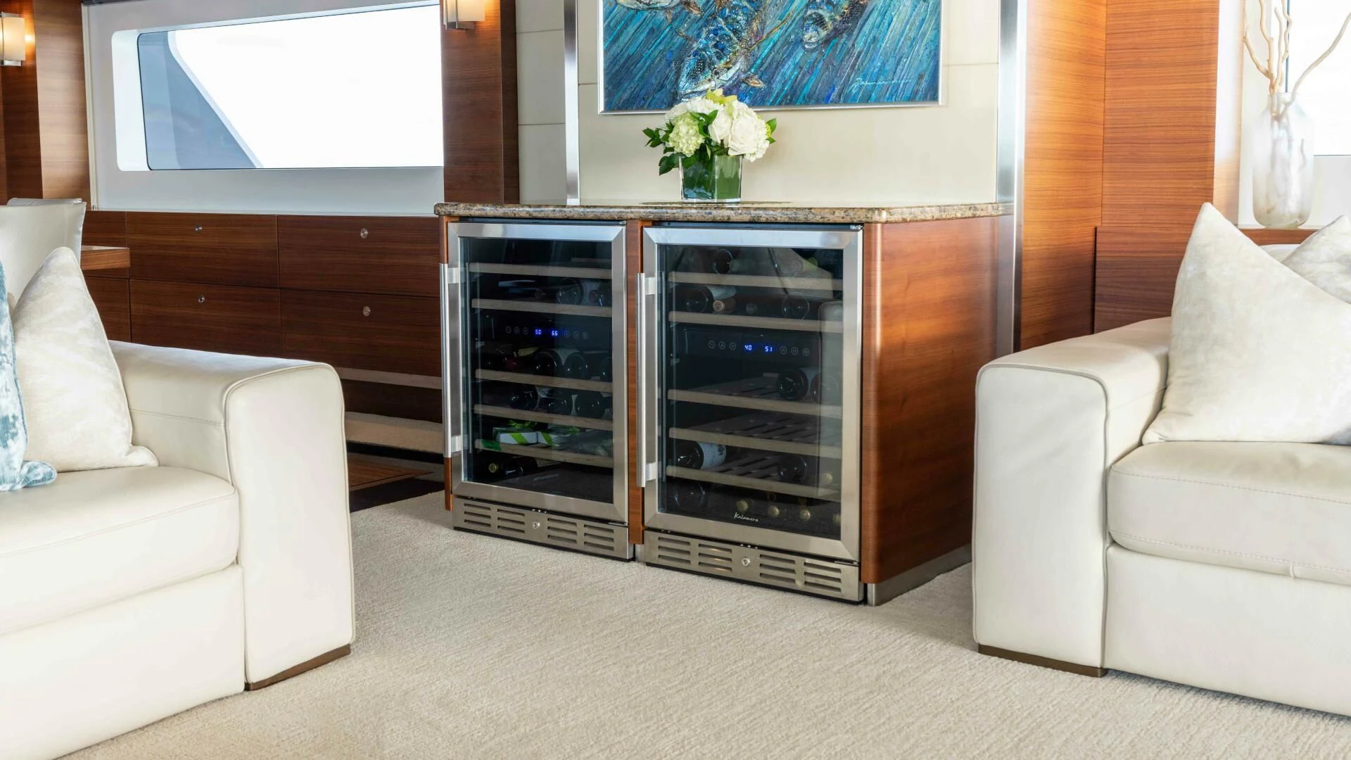a living room with a fireplace aboard SEA AXIS Yacht for Charter