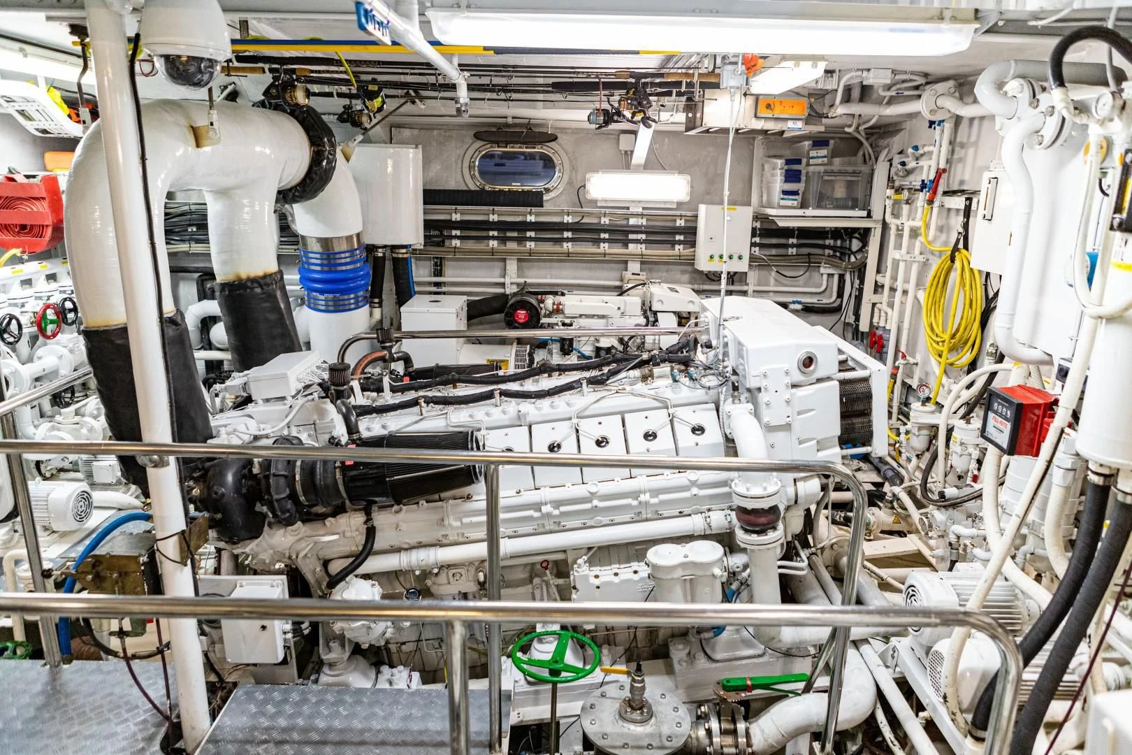 a factory with several white pipes aboard SEA AXIS Yacht for Charter