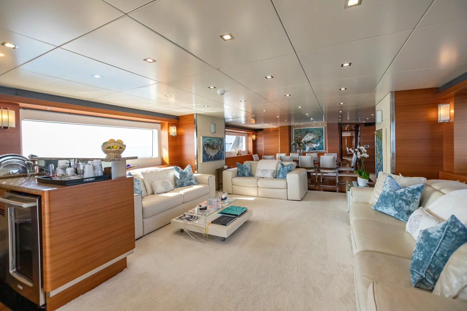 a living room with a couch and a coffee table aboard SEA AXIS Yacht for Charter