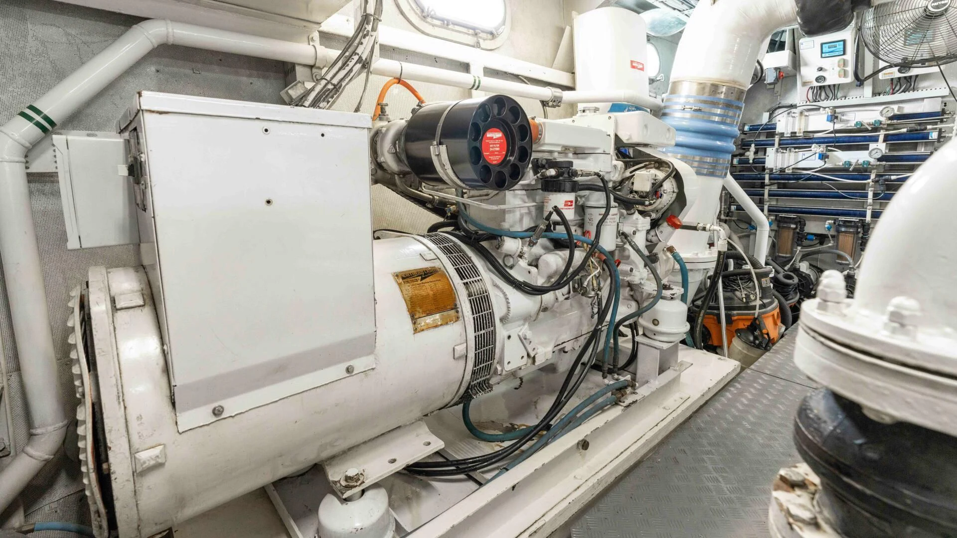 a white machine with a black and red light aboard SEA AXIS Yacht for Charter