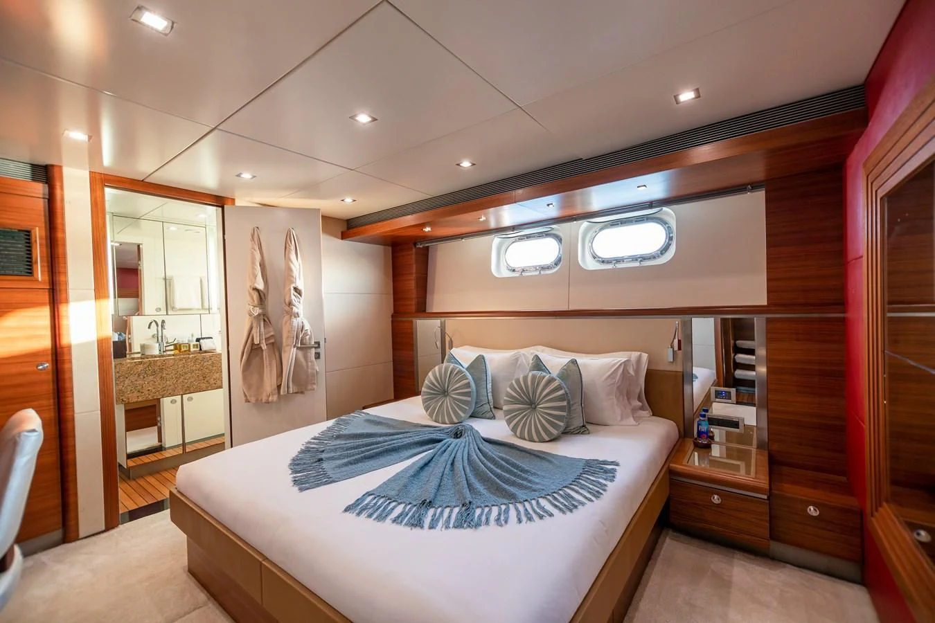 a bedroom with a large bed aboard SEA AXIS Yacht for Charter