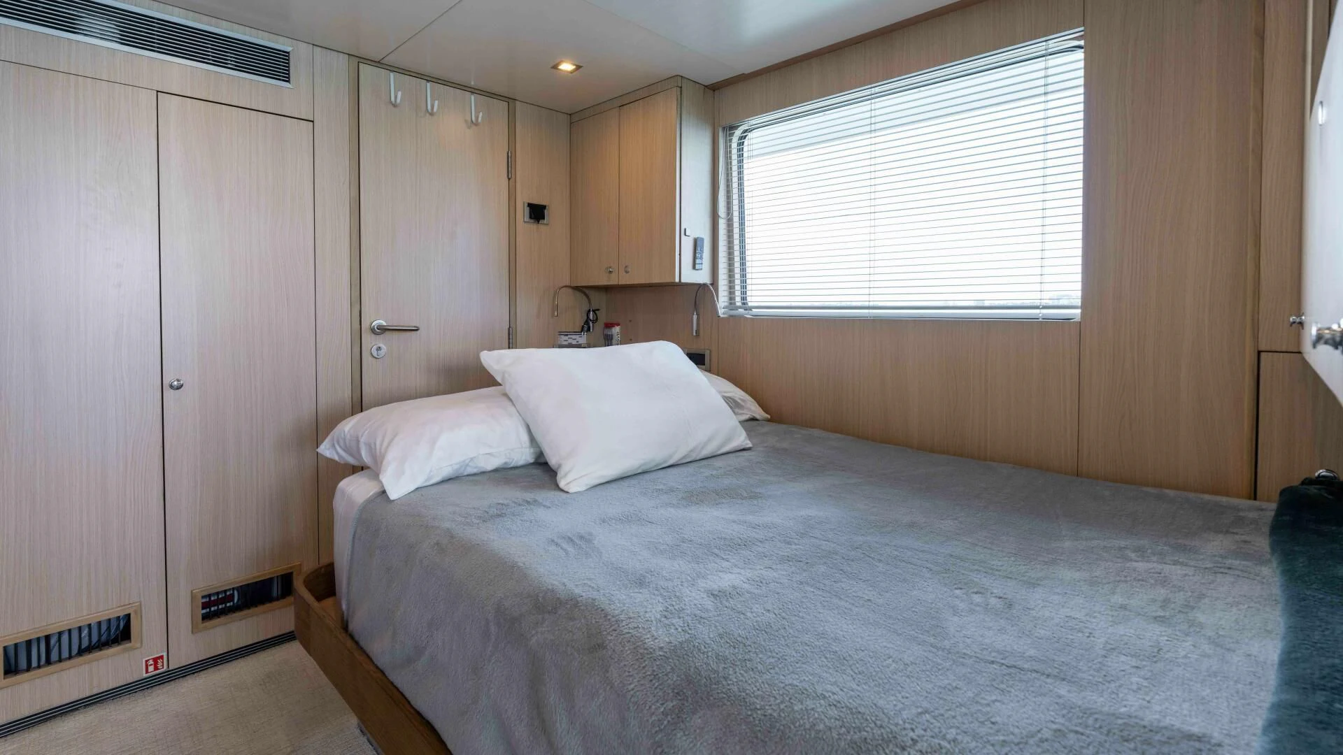 a bed in a room aboard SEA AXIS Yacht for Charter