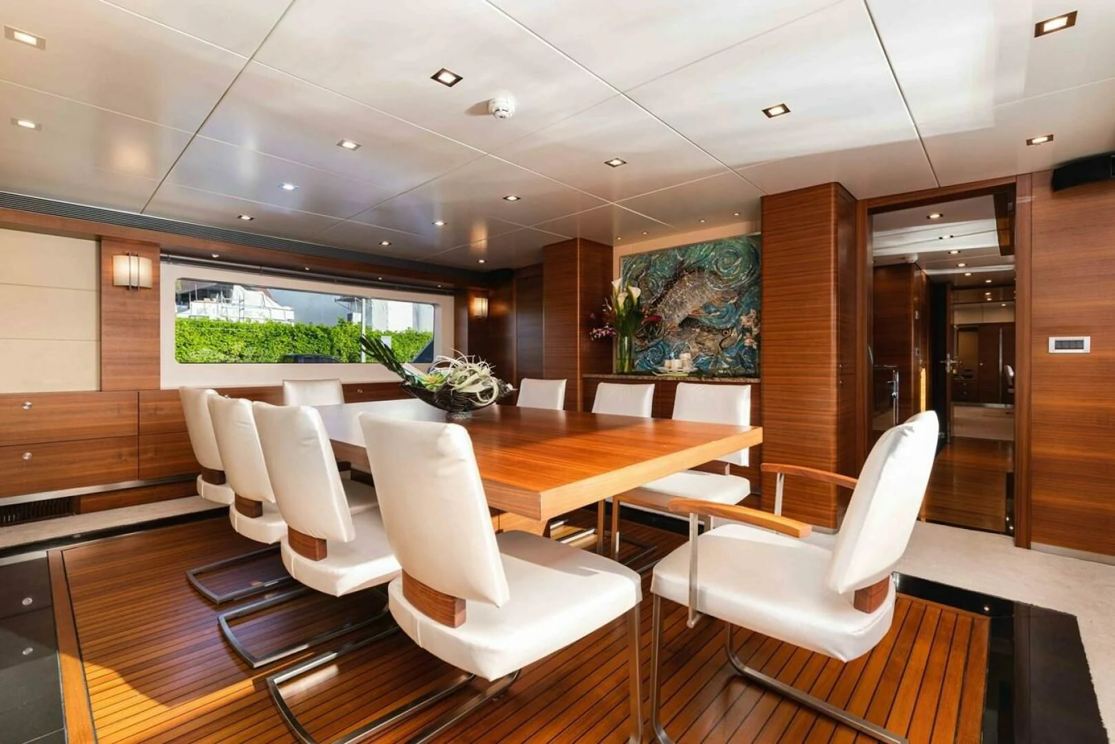 a room with chairs and tables aboard SEA AXIS Yacht for Charter