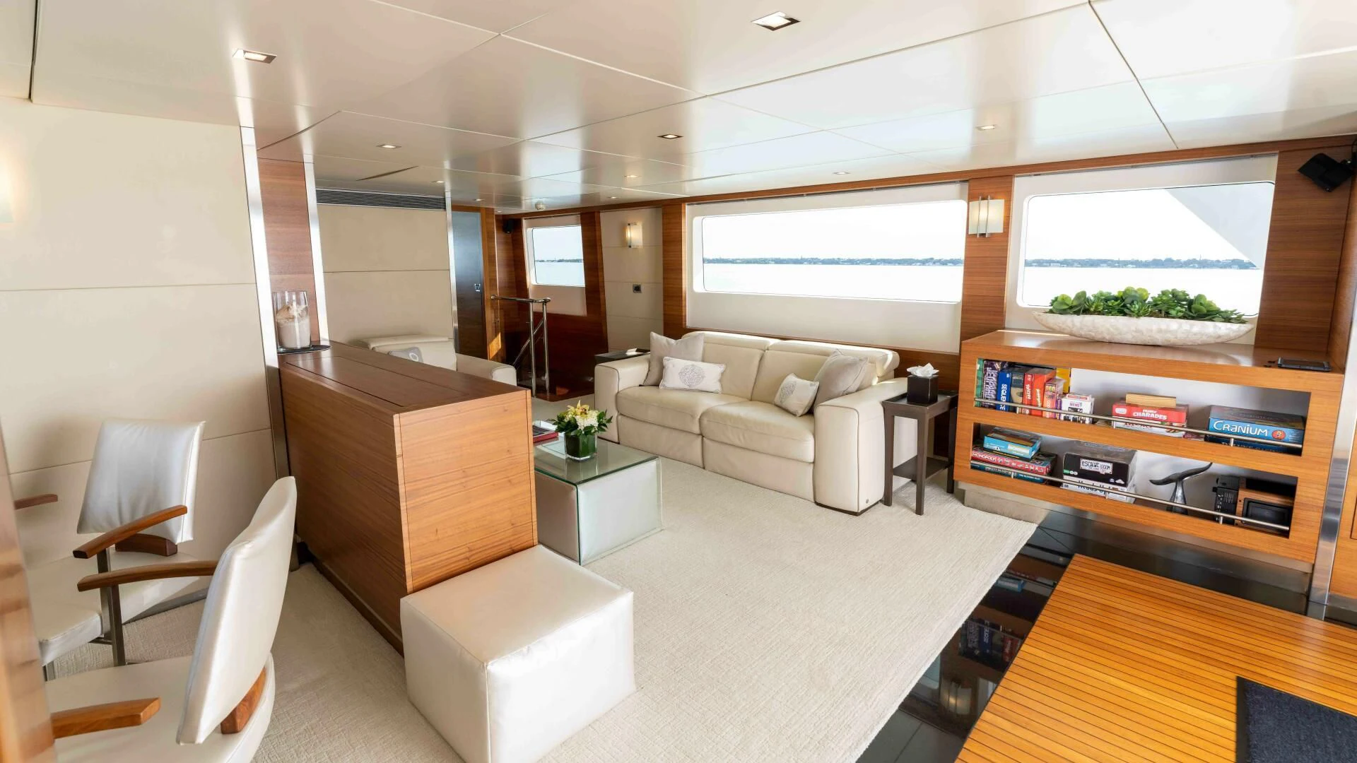 a living room with a couch and a coffee table aboard SEA AXIS Yacht for Charter
