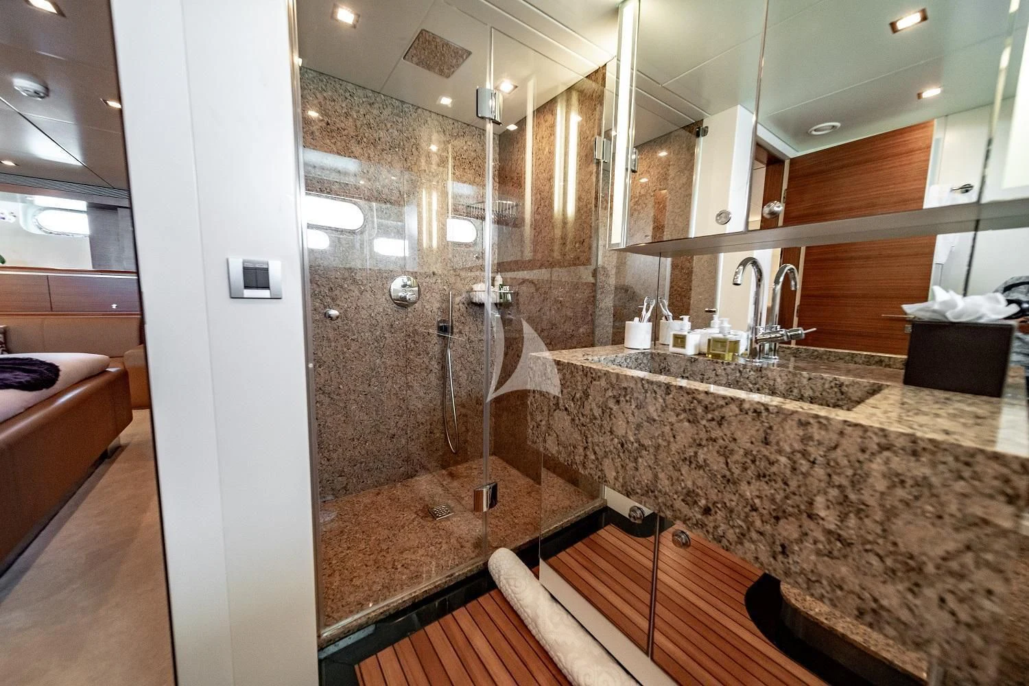 a bathroom with a large marble countertop aboard SEA AXIS Yacht for Charter