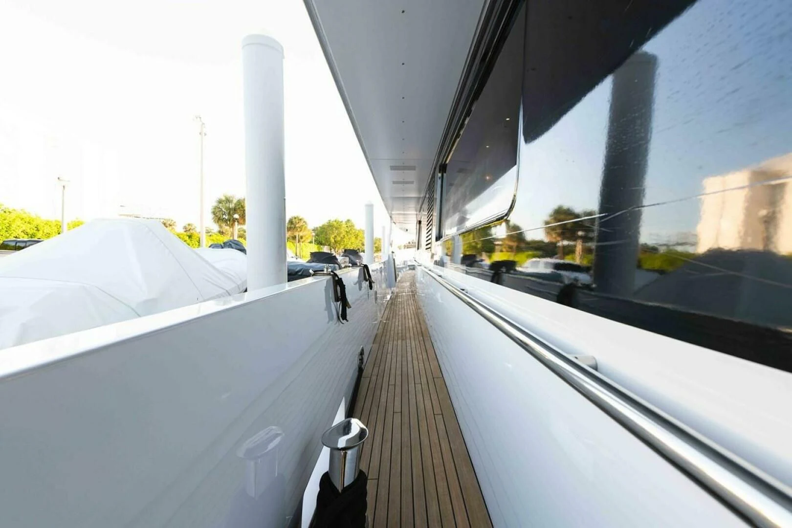 a person walking on a sidewalk aboard SEA AXIS Yacht for Charter