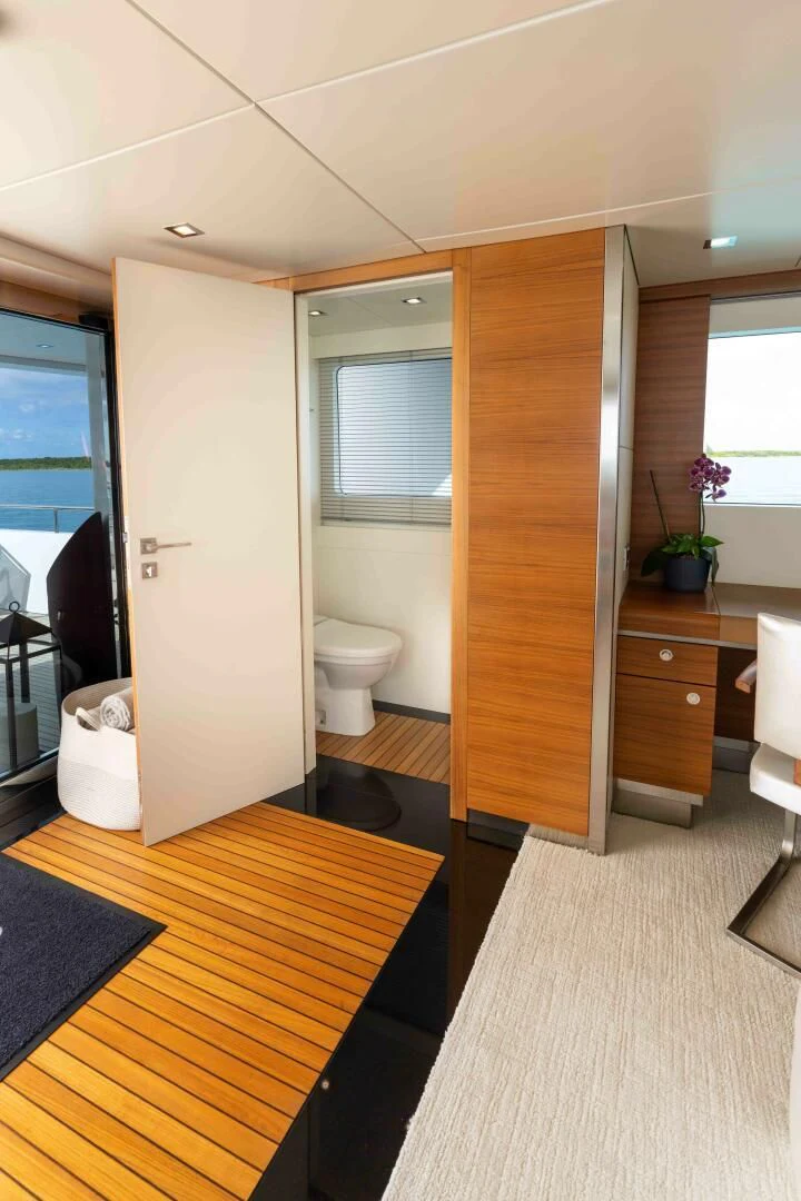 a bathroom with a standup shower aboard SEA AXIS Yacht for Charter
