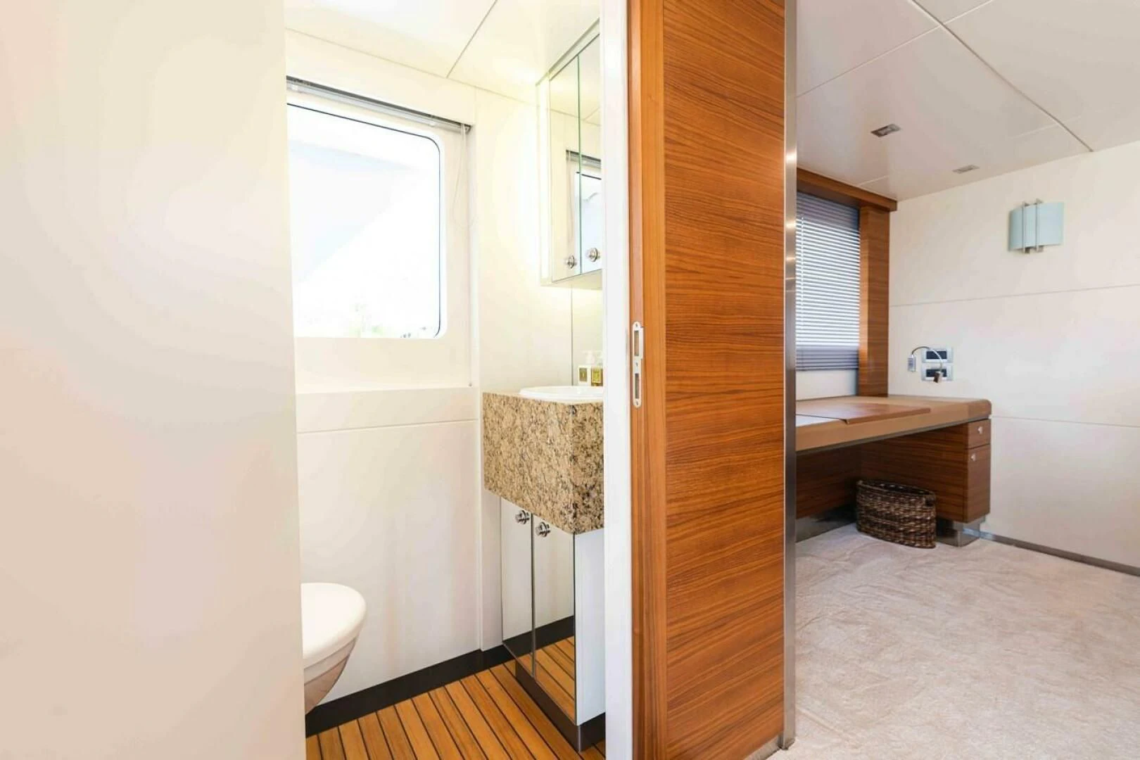 a bathroom with a sink and a tub aboard SEA AXIS Yacht for Charter