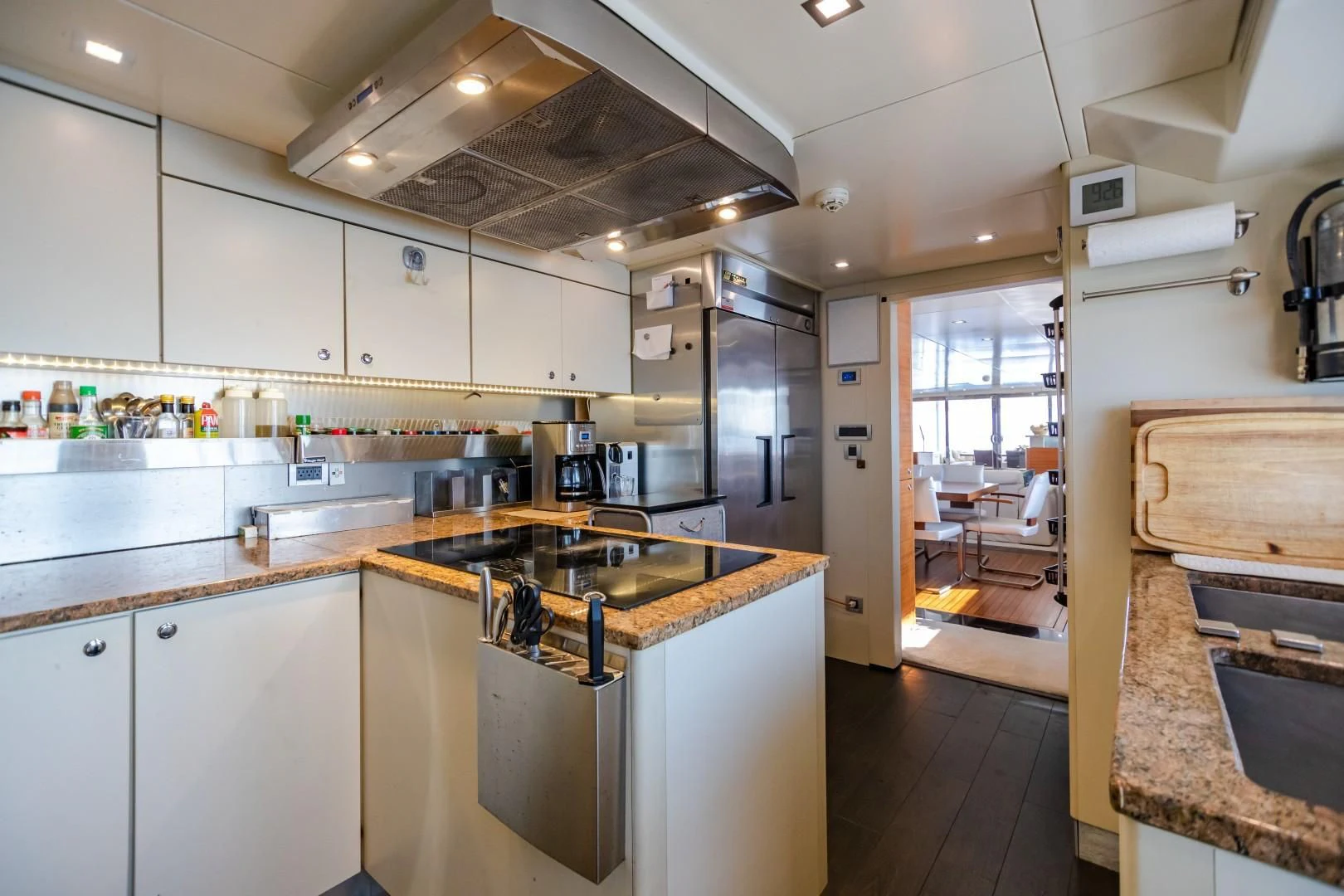 a kitchen with a large island aboard SEA AXIS Yacht for Charter