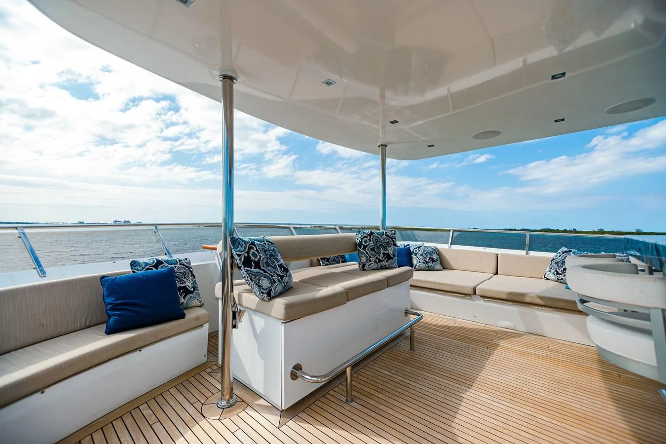 a room with a bed and a large window aboard SEA AXIS Yacht for Charter