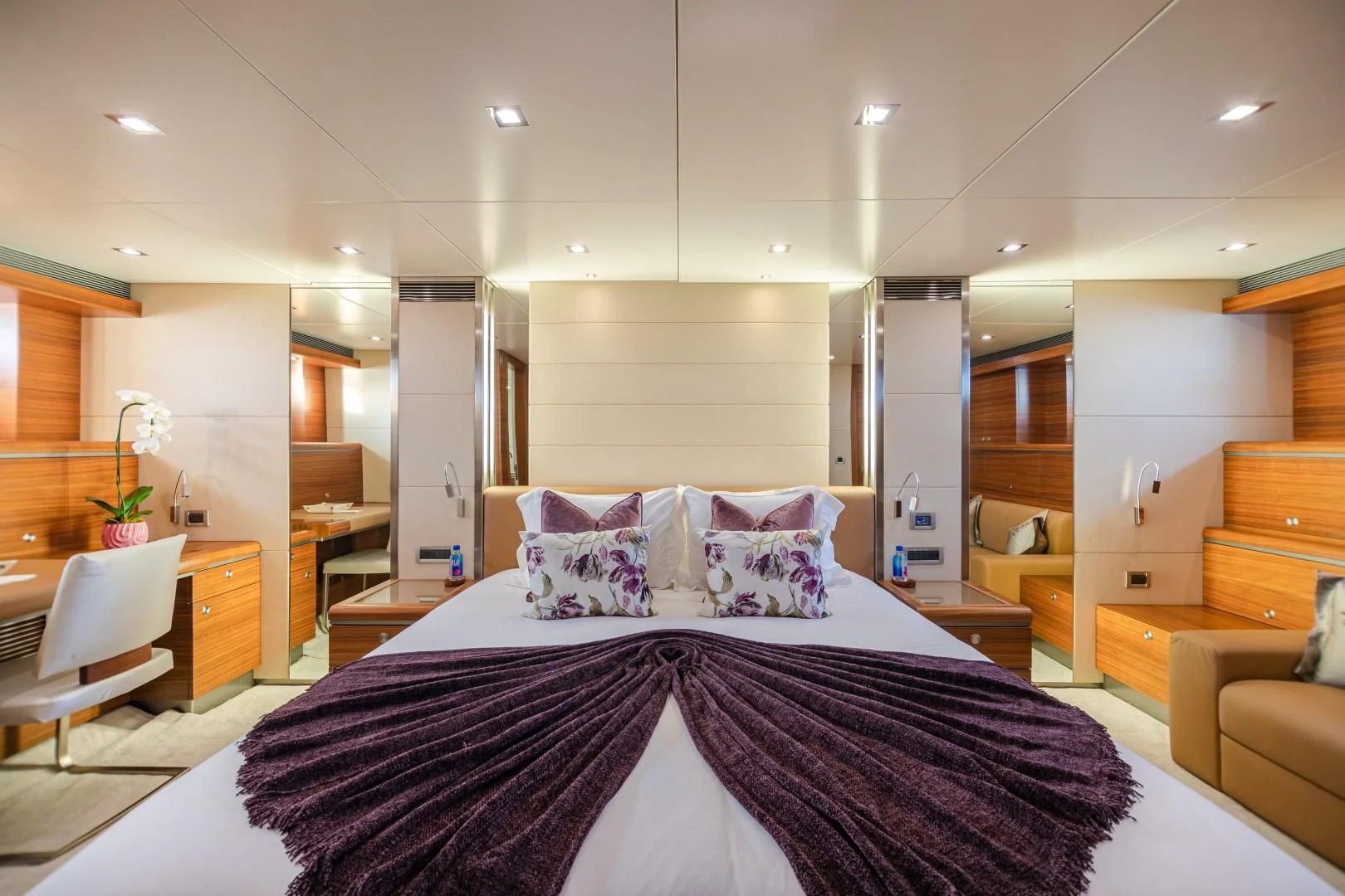 a large bedroom with a large bed aboard SEA AXIS Yacht for Charter