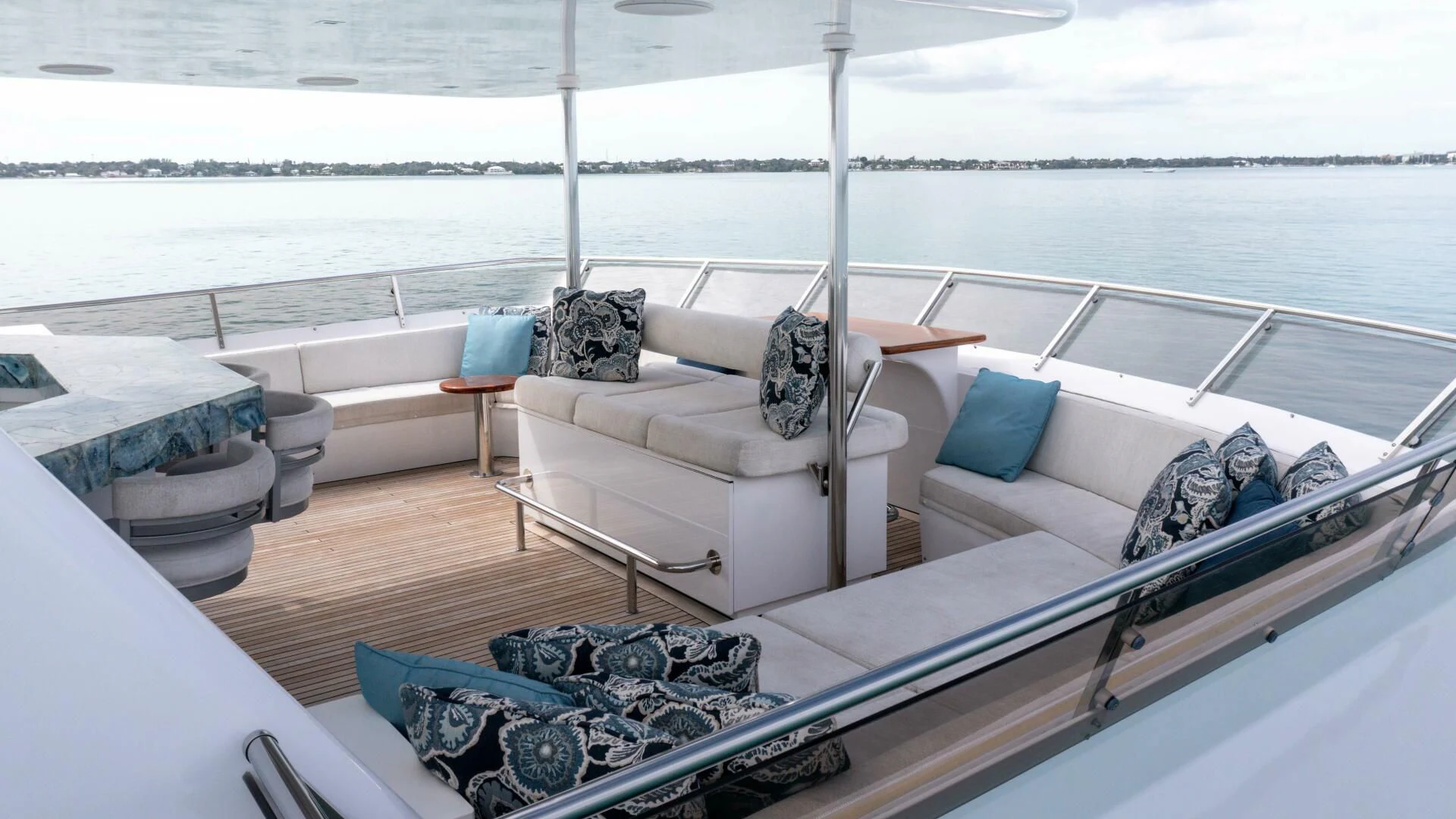 a boat with a couch and a chair on the deck aboard SEA AXIS Yacht for Charter