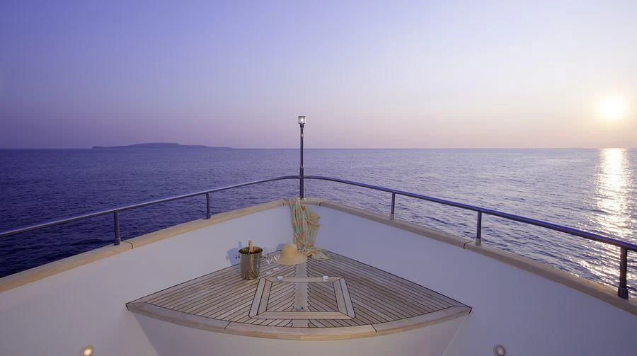 a large ship on the water aboard GLAROS Yacht for Sale