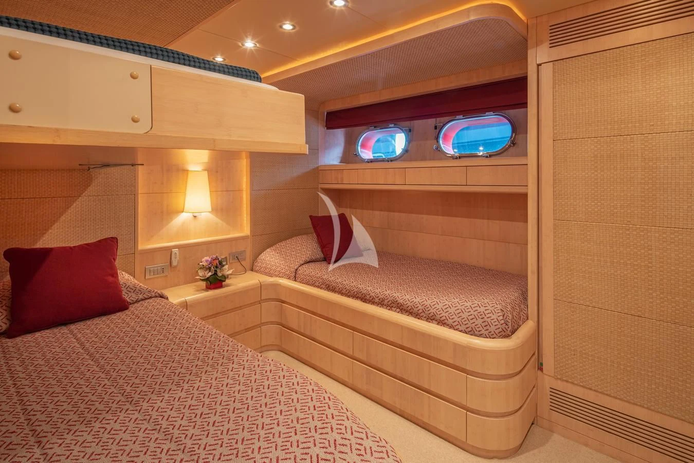 a room with two beds aboard GLAROS Yacht for Sale